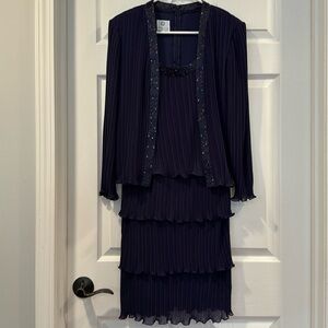 Beautiful navy dress with just the right amount of Sparkle!